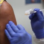 US surgeon general and Trump administration scientist say it is unlikely that coronavirus vaccine will be ready by election