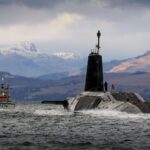A COVID-19 outbreak struck a UK ballistic-missile sub after sailors broke isolation rules at a US Navy base