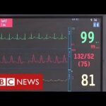 Huge pressure on hospitals as coronavirus cases surge – BBC News