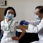 Japan starts COVID-19 vaccinations with eye on Olympics
