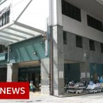 Hong Kong's hospitals overwhelmed amid spike in Covid cases – BBC News