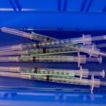 US CDC panel urges broad use of updated COVID-19 vaccines